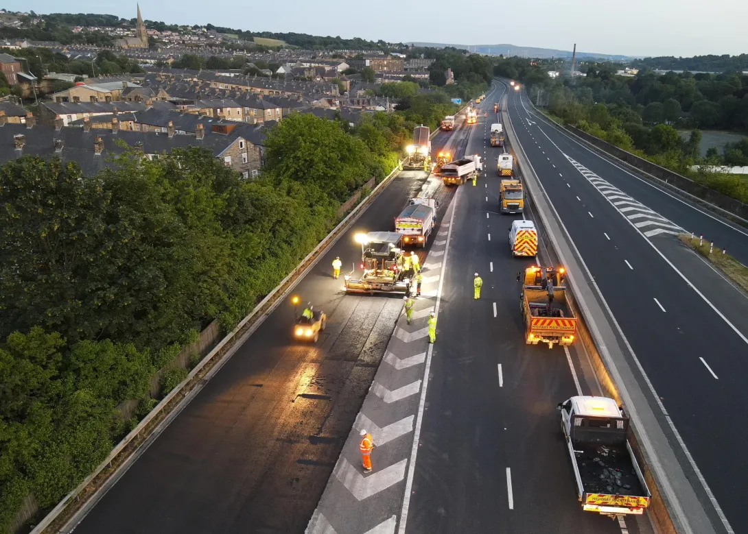 Aggregate Industries vehicles on the M65 in Lancashire laying the new low carbon Foamix product as part of trials with Lancashire County Council