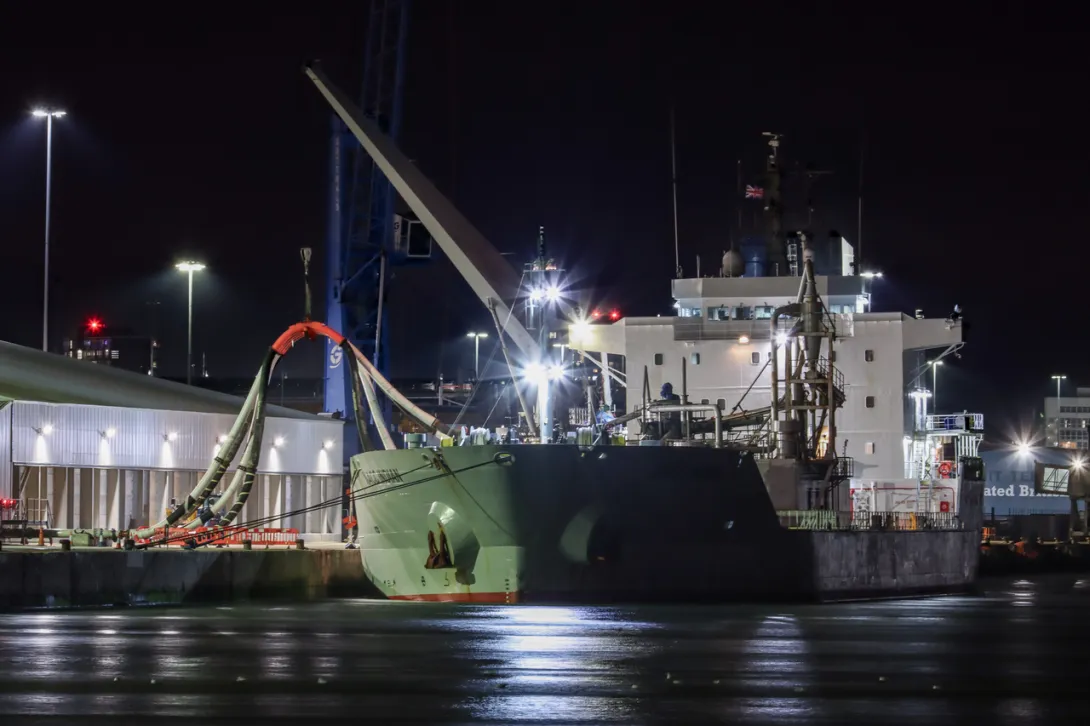 The NACC Indian ship discharging cementitious materials at night after berthing at the Port of Southampton Cement Terminal