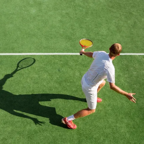 shutterstock_2029821257_synthetic-tennis-court.jpg