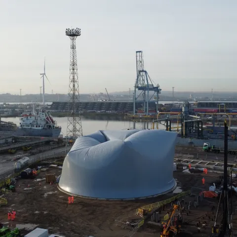 An aerial shot showing the new dome silo being inflated at Aggregate Industries cement facility at Tilbury Docks